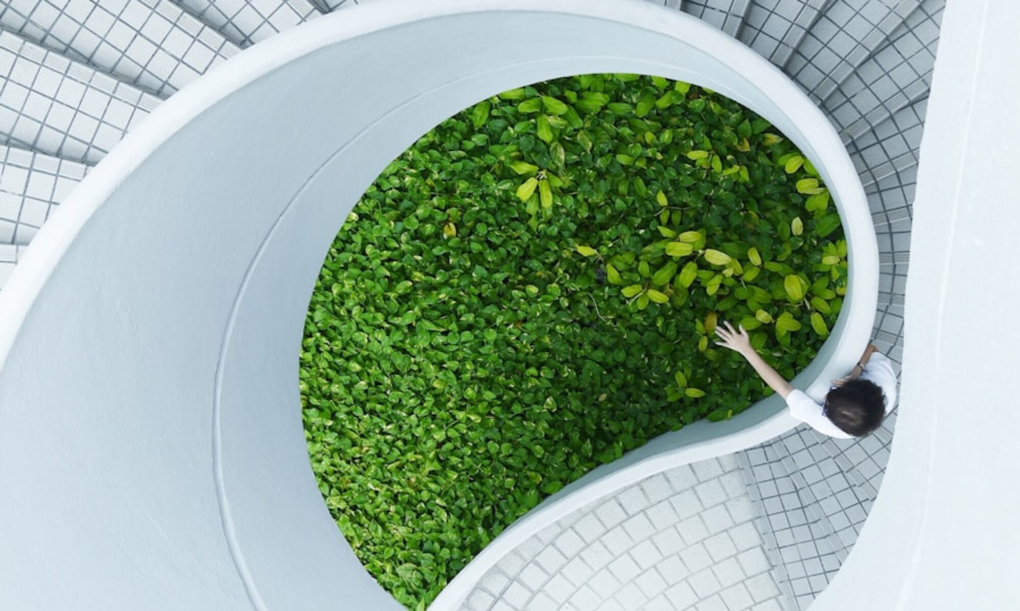 woman standing spiral stairs